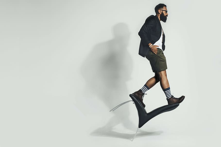 man standing on chair, people, hipster, socks, stripes, beard HD wallpaper