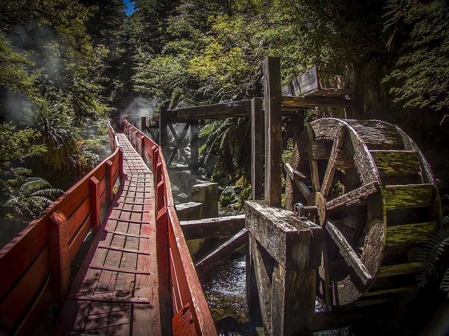 red steel suspension bridge besides brown water mill, mill wheel, HD wallpaper