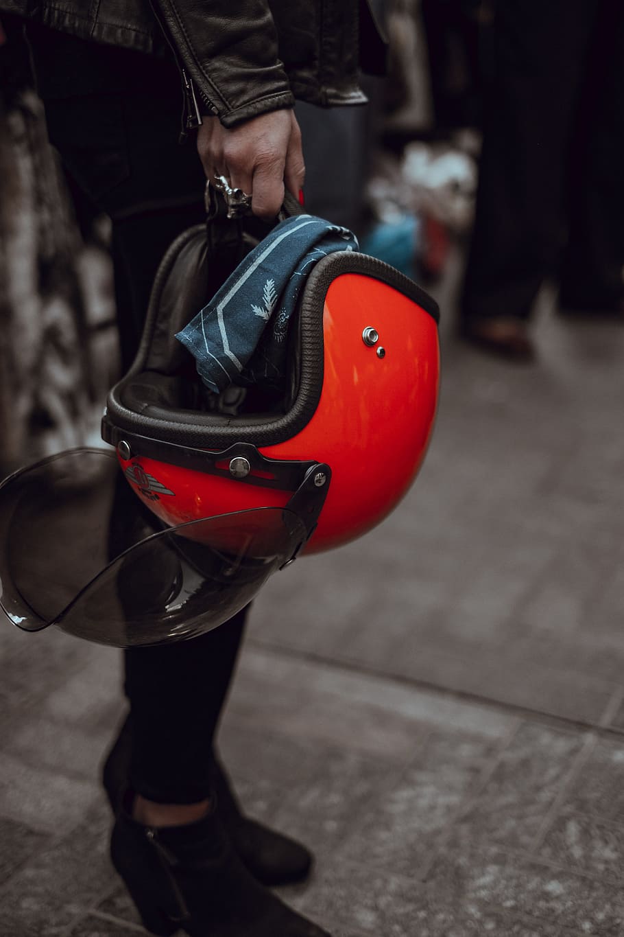 person holding red half-face helme, person holding modular helmet HD wallpaper