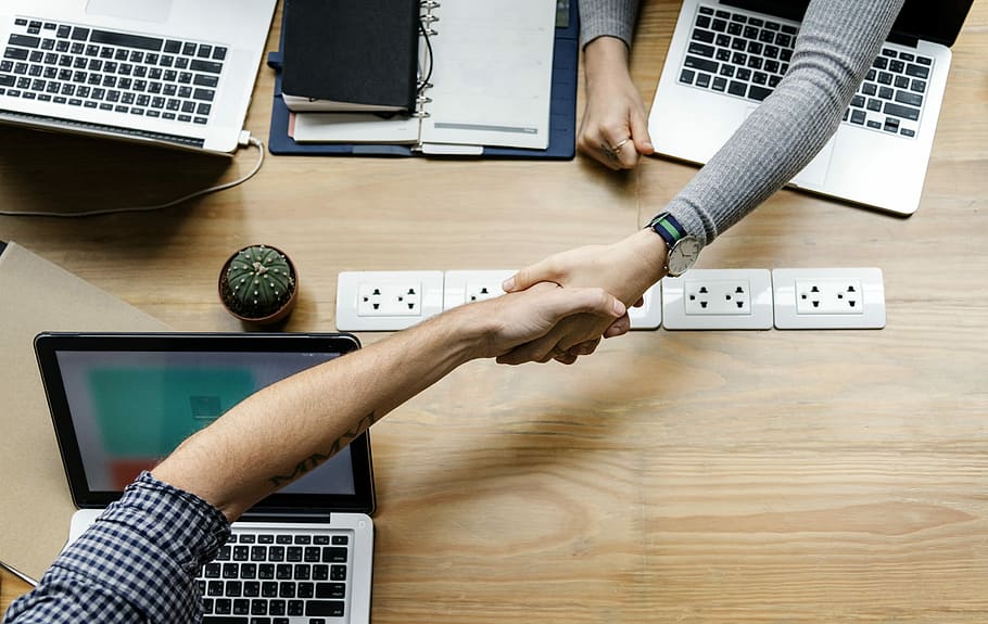 two people shaking hands, achievement, agreement, collaboration