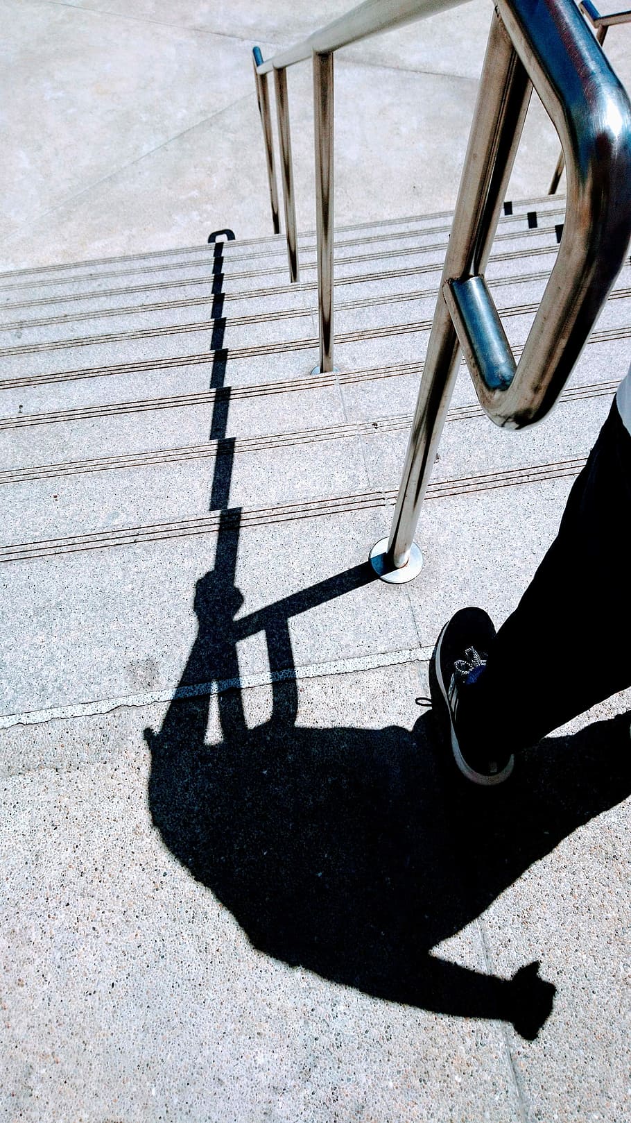shadow of a person standing on staircase, person standing near handrails HD wallpaper