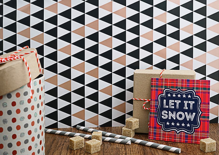 red and black Let It Snow greeting card artwork, grey and white straw beside brown box HD wallpaper