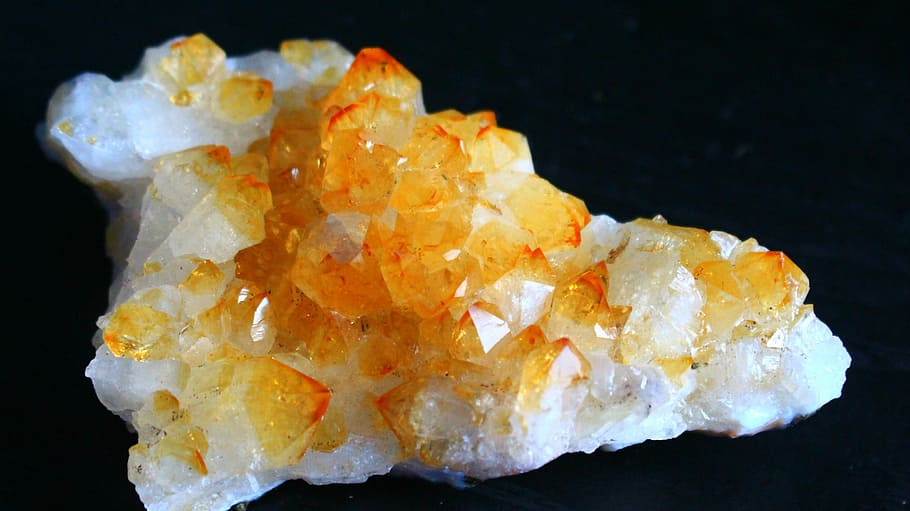 white and orange geode on black surface, yellow, stone, citrine, HD wallpaper