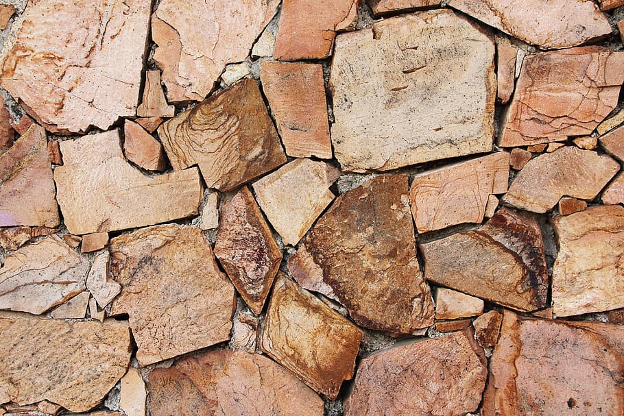 closeup photo of brown rocks, stone, asymmetry, wall, texture