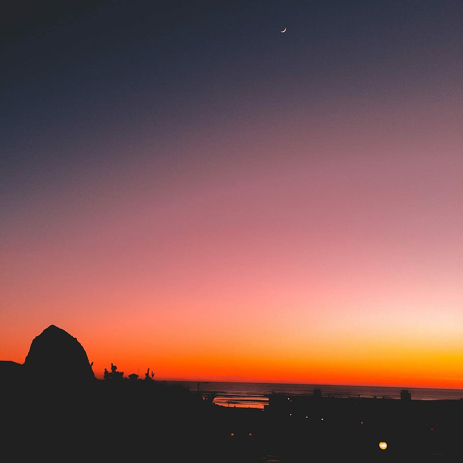 silhouette of rock, beautiful, moon, sunset, cannon beach, ocean HD wallpaper