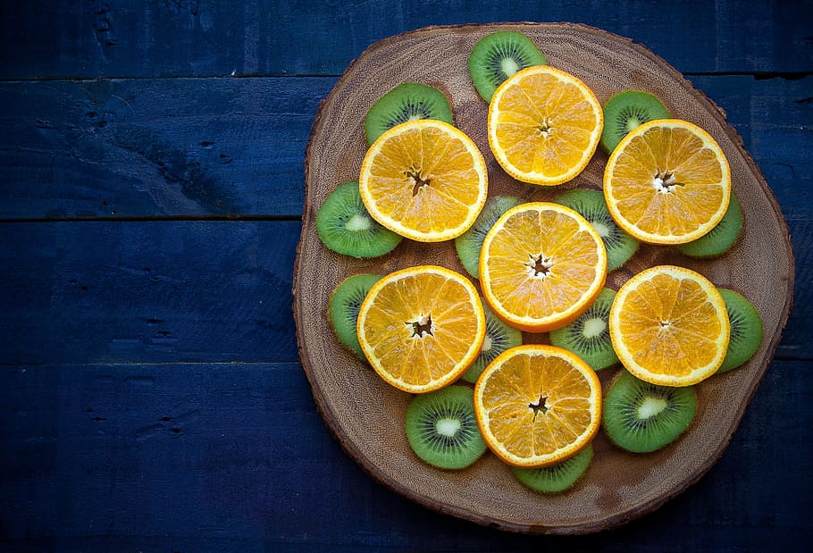 citrus fruit and kiwi on brown slab, orange, wood, table, blue, HD wallpaper