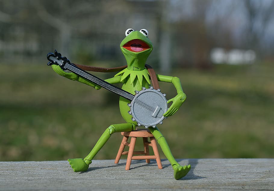Kermit the frog playing banjo, muppet, puppet, toy, childhood