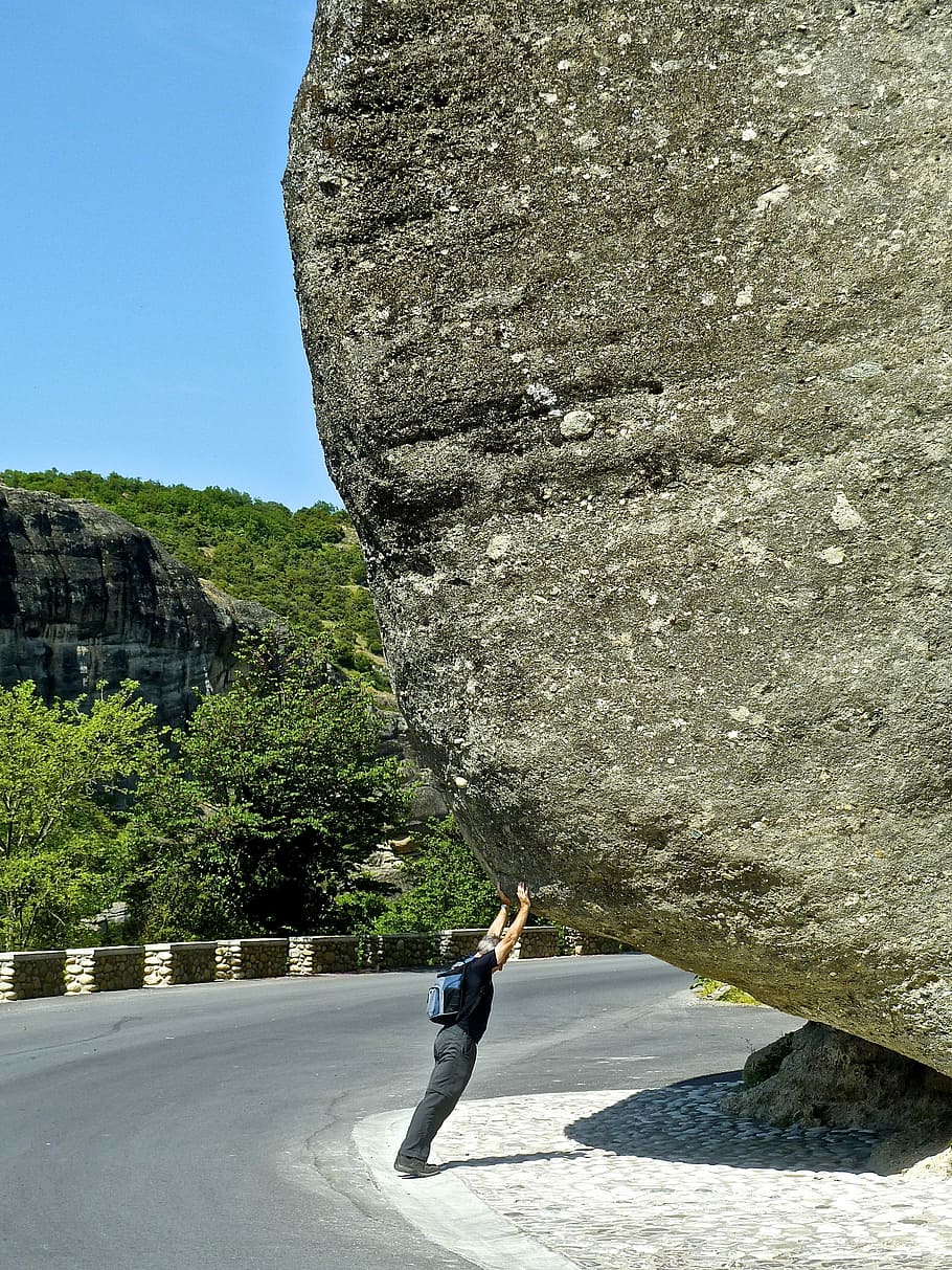 man holding rock formation, Power, mighty, effort, uphill, heavy HD wallpaper
