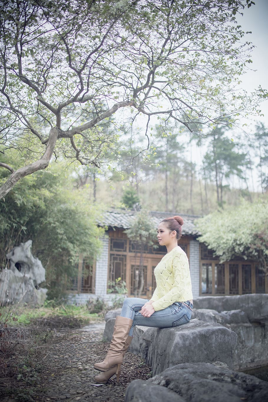 woman sitting on rock outdoors, Photo, Yard, Trees, Jeans, the yard