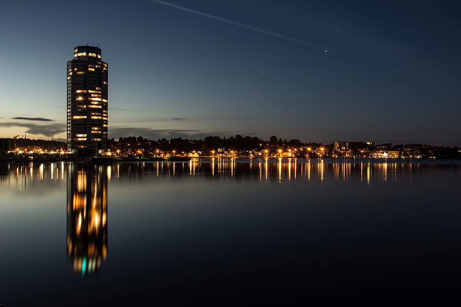 sunset, waters, reflection, city, dusk, sky, night, illuminated HD wallpaper