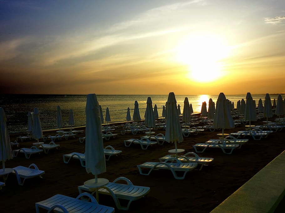 beach, sunset, empty, sun loungers, holiday, sky, sea, water HD wallpaper