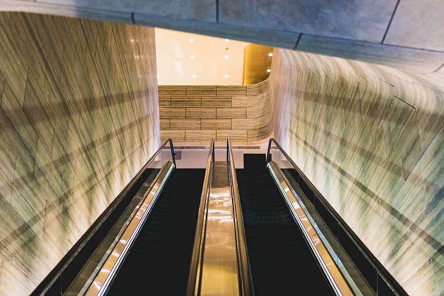 worm eye view of escalator, black and gray escalator inside the building HD wallpaper