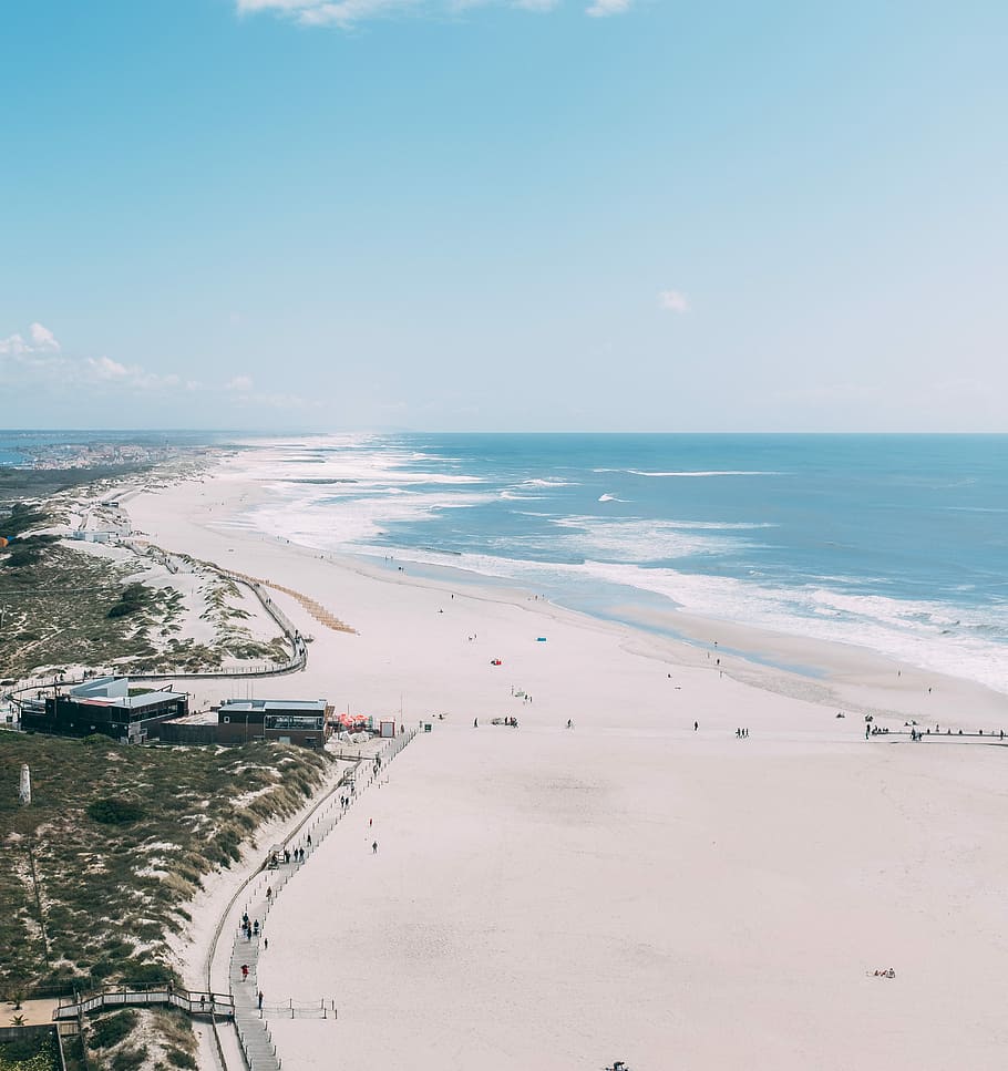 aerial view photography of people walking near sea during daytime, scenery of a port beside a body of water HD wallpaper