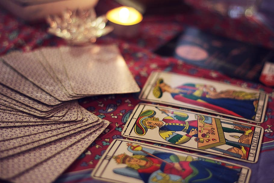 tarot cards on red floral textile, fortune, symbol, mystery, paranormal, HD wallpaper