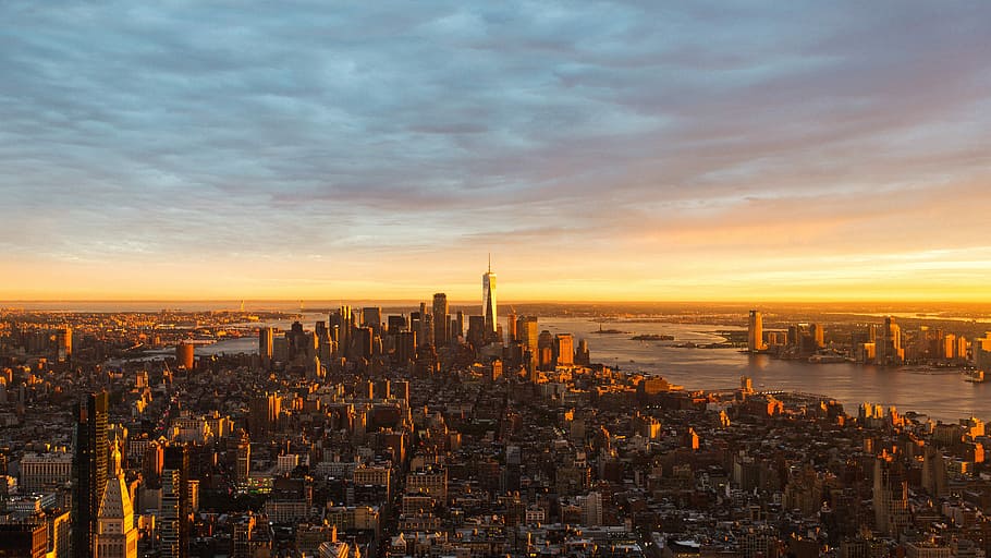 aerial photography of cityscape, Island of Manhattan during sunset aerial photography HD wallpaper