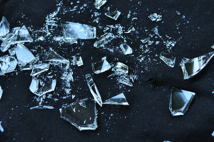 photo of clear glass shards, broken, shattered, broken glass
