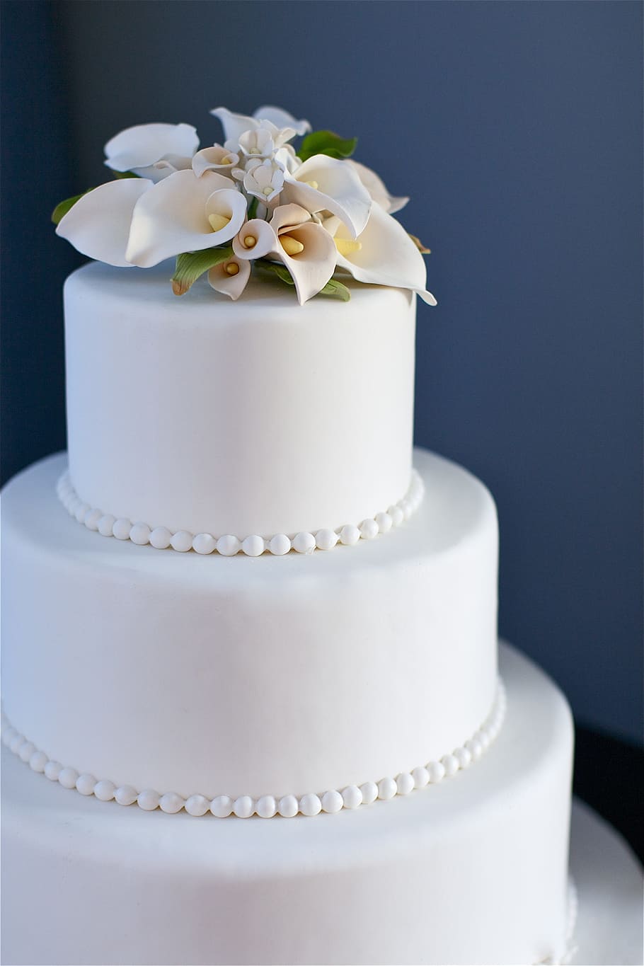 white icing coated 3-tier fondant cake photograph, blue, wedding cake