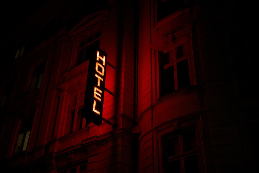 red hotel signage, white hotel LED signage turned on, neon, light