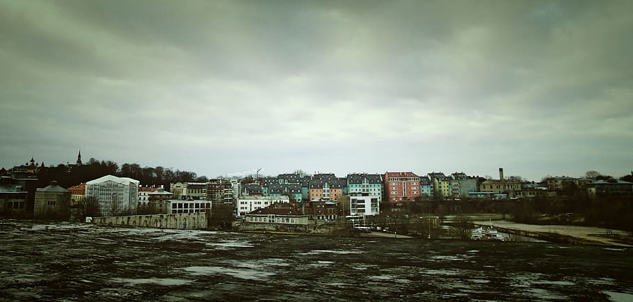 Assorted Color Concrete Building Under Cloudy Sky, architecture HD wallpaper