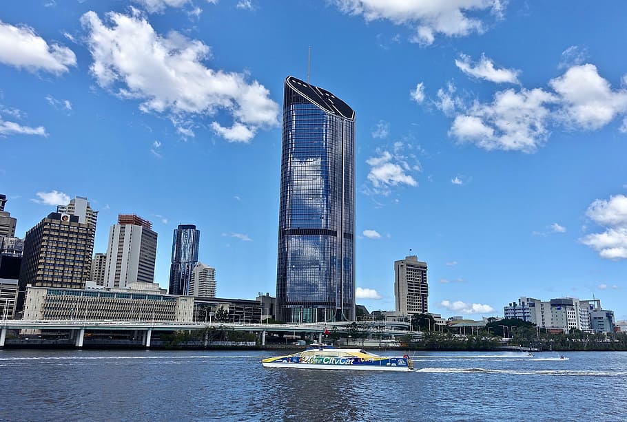 glass high-rise building near body of water at daytime, skyscraper HD wallpaper