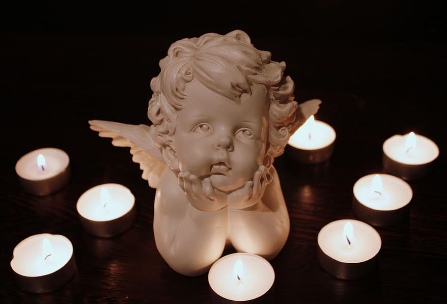 white cherub figurine besides candles inside dark room, angel, HD wallpaper
