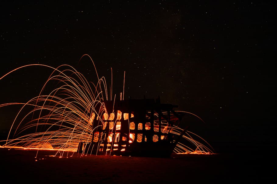 timelapsed photo of lighted house, fire cracker during night time HD wallpaper