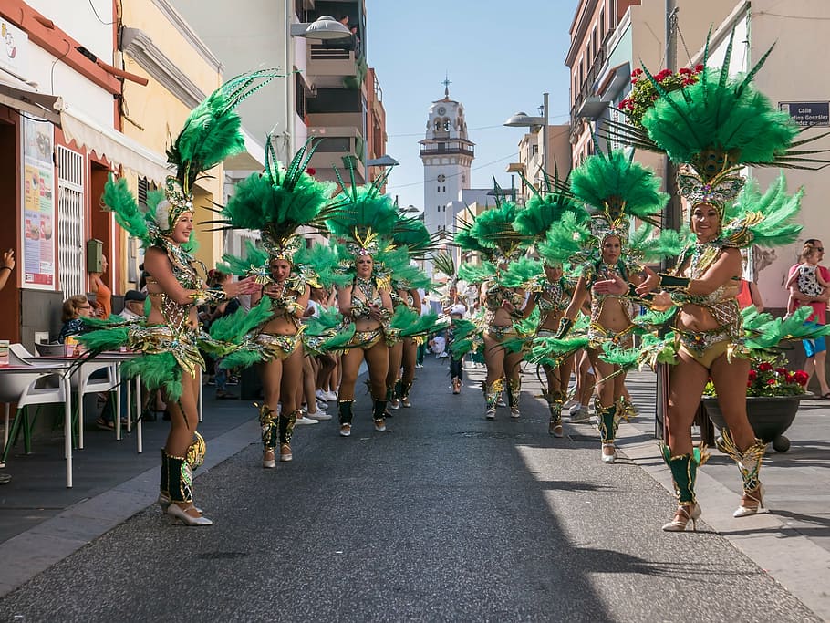 carnival, troupe, dance, costume, female, green, feathers, show