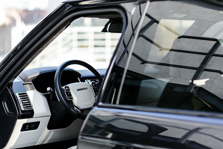 close-up photography of black and gray vehicle interior, range rover HD wallpaper