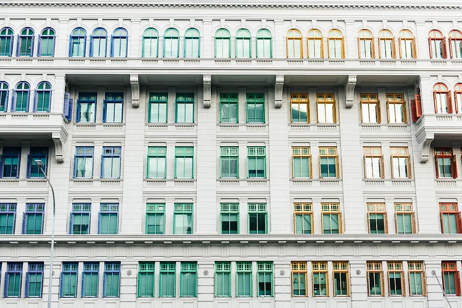 white concrete building with glass windows, photo of white concrete building during daytime HD wallpaper