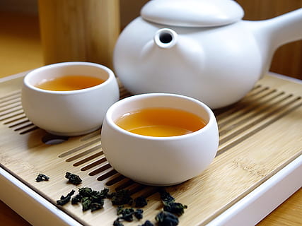 white ceramic teacup with tea near teapot on table, chinese tea HD wallpaper