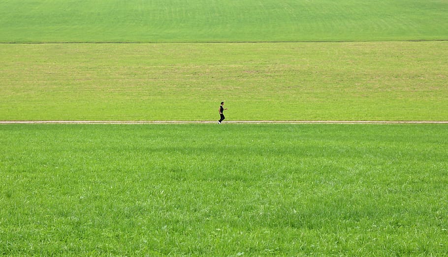 person walking in the middle of green field, jog, alone, lonely HD wallpaper