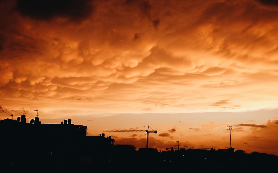 silhouette photo of buildings under the cloudy sky, silhouette of buildings during sunset HD wallpaper
