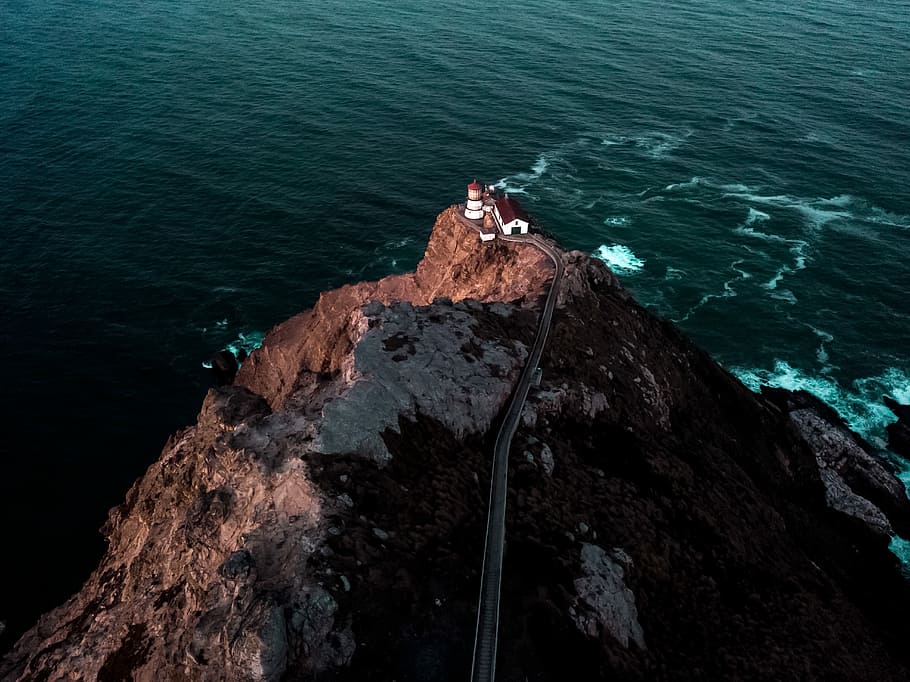 aerial photography of brown mountain, aerial photography of lighthouse HD wallpaper