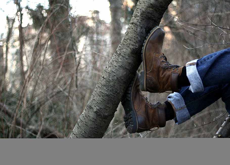 person showing pair of brown leather boots, tree, forest, jeans HD wallpaper