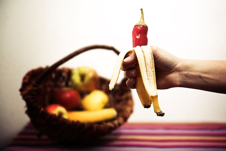 person holding yellow banana peel, pepperoni, composition, eat HD wallpaper