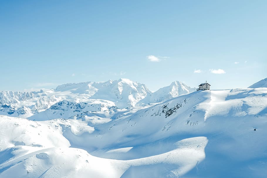 house on top of snow covered hills and mountains during day, photo of house on glacier mountain under blue sky HD wallpaper