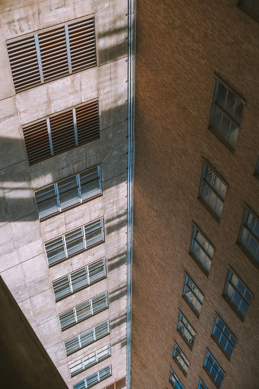 brown painted building, bricks, shadow, concrete, windows, shutters HD wallpaper