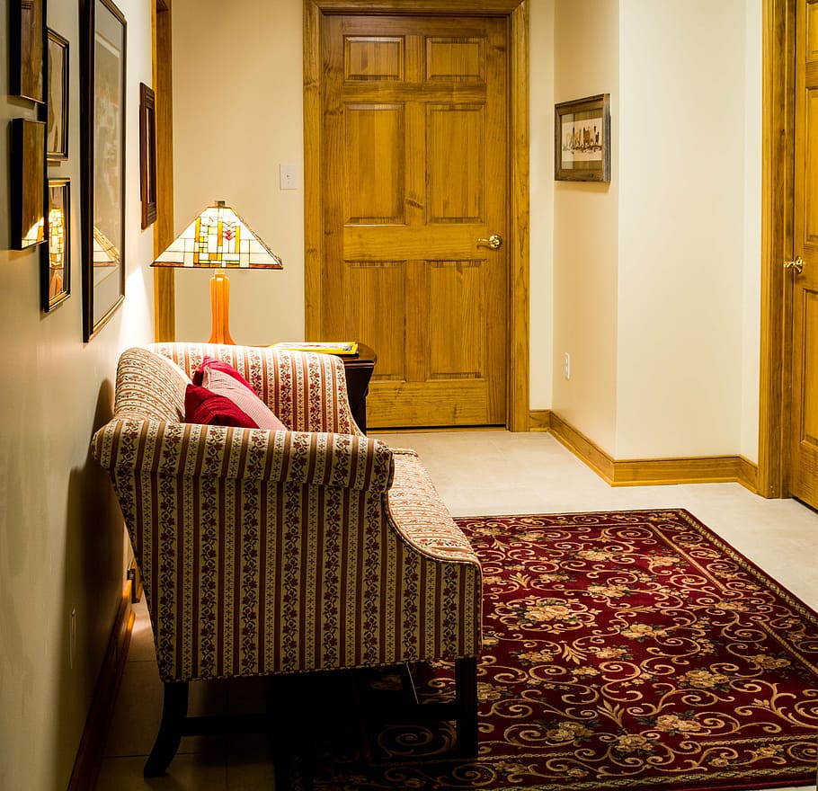 empty sofa and closed door, hallway, passageway, corridor, furniture HD wallpaper