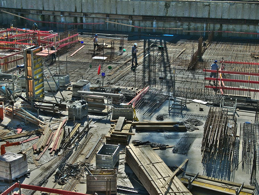 aerial photography of rebar cages on surface, Construction Site