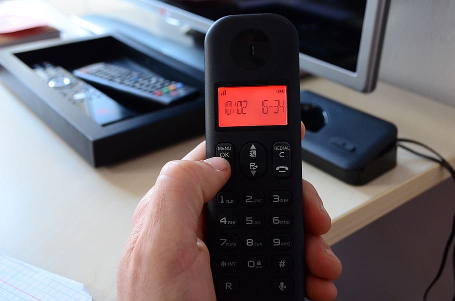 black remote control reading 10/02, phone, call, communication HD wallpaper