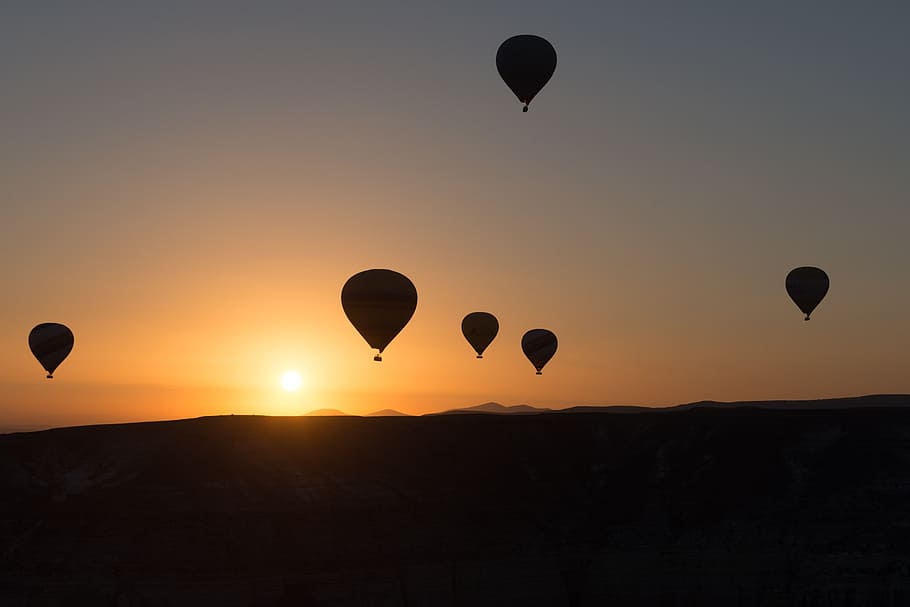 silhouette of hot air balloons floating on air during golden hour, HD wallpaper