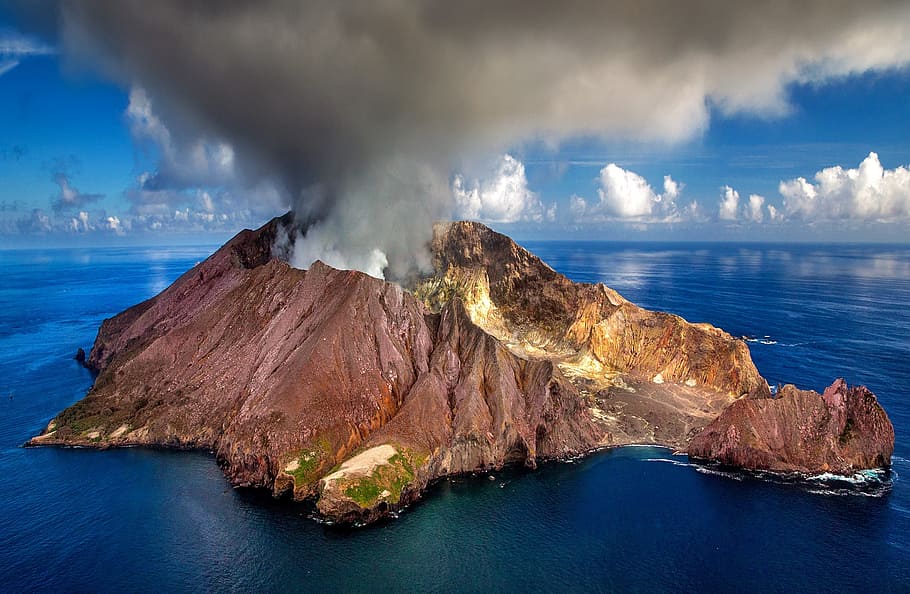 brown volcano on body of water, new zealand, white island, active volcano