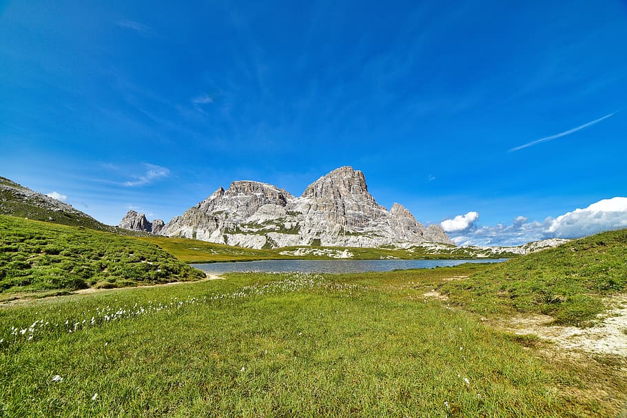 green grass field, nature, mountain, landscape, panoramic, sky HD wallpaper