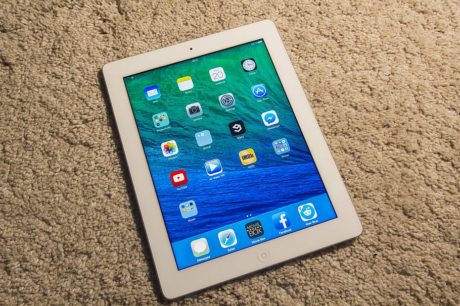 white iPad turned-on on beige textile, electronic tablet, high tech HD wallpaper