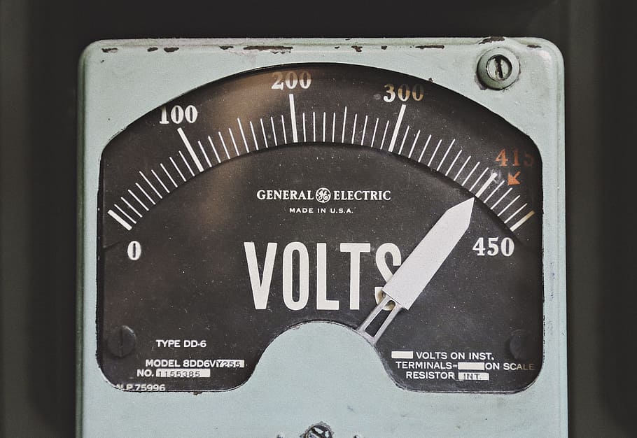 gray GE volt meter at 414, black and gray GE voltmeter at 415