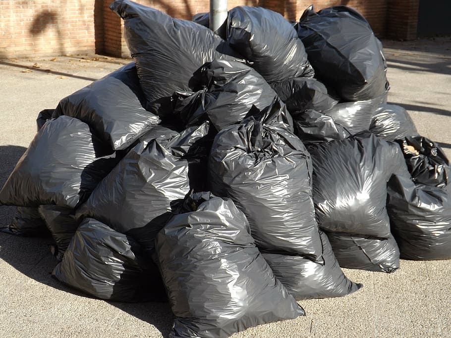 pile of black plastic bag lot, garbage, bags, waste, pollution