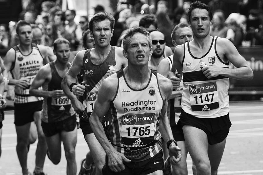 grayscale photography of man running on field, london marathon