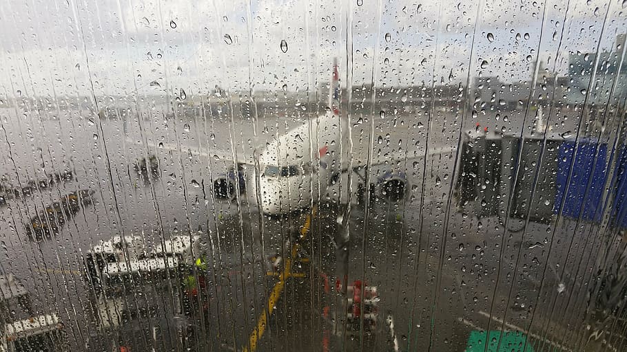 glass panel with rain drops, airport, terminal, plane, wet, glass - material