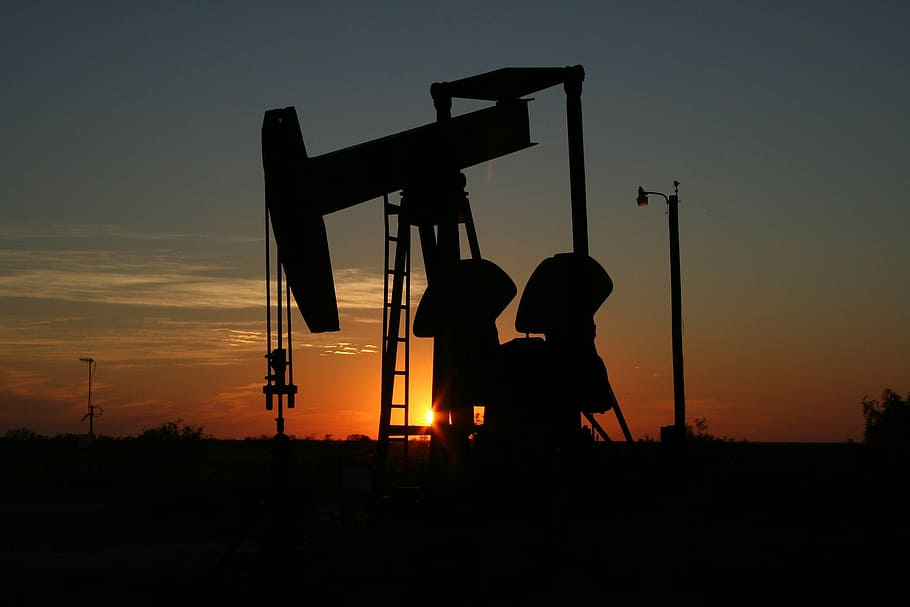 Oil Derrick in the sunset in Texas, dusk, photos, public domain
