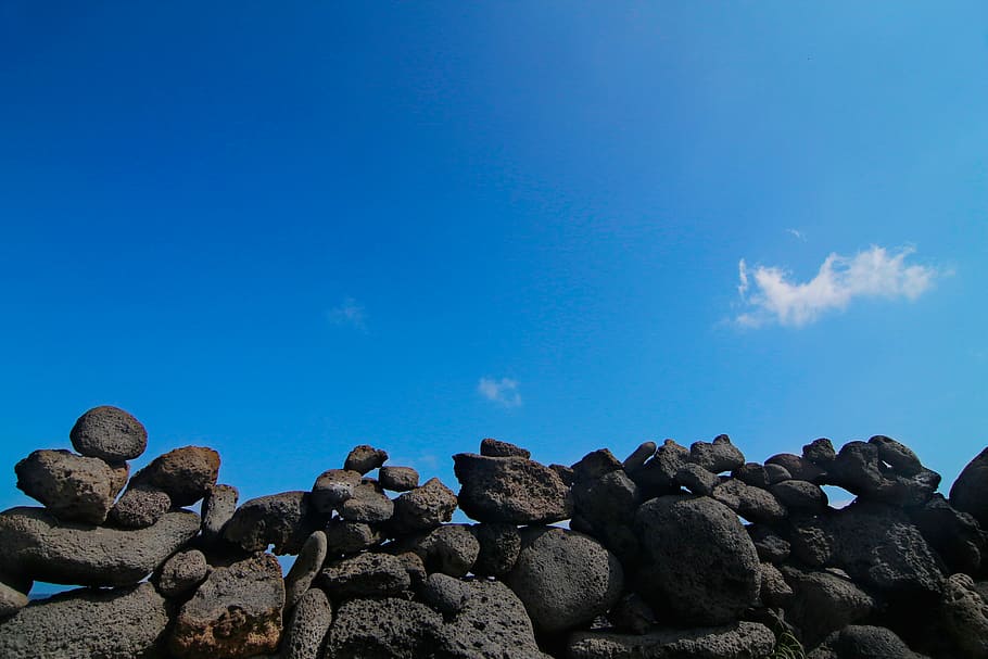 gray stone formation, cozy seopji, jeju island, beach, sea, stone wall